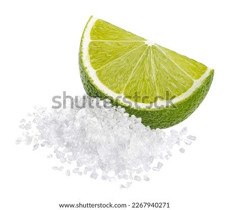 Lime slice with salt, margarita cocktail ingredient isolated on white background Royalty-Free Stock Photo #2267940271