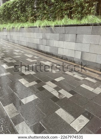 a pattern of stone floors under a very beautiful and cool garden
