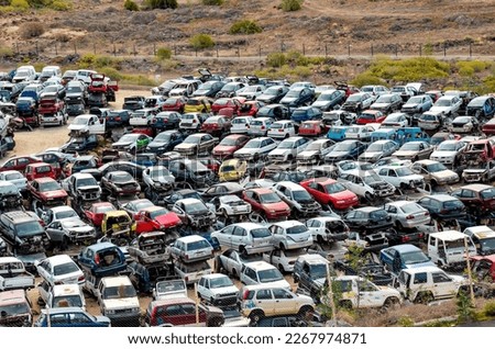 Scrap Yard With Pile Of Crushed Cars in tenerife canary islands spain Royalty-Free Stock Photo #2267974871