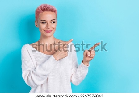 Photo of gorgeous lovely lady wear white stylish clothes two arm presenting empty space novelty isolated on blue color background