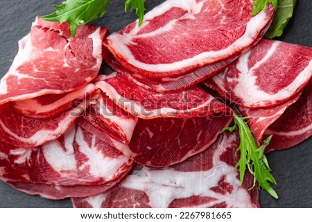 coppa cured meat sausage pork neck meal food snack on the table copy space food background rustic top view Royalty-Free Stock Photo #2267981665