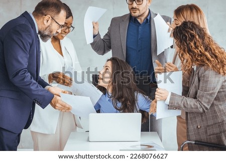 Shot of a young businesswoman looking anxious in a demanding office environment. Frustrated millennial female worker felling tired of working quarreling. Workplace Conflicts.  Royalty-Free Stock Photo #2268076627