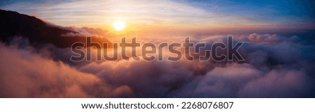 Beautiful sky over clouds at sunset time Royalty-Free Stock Photo #2268076807