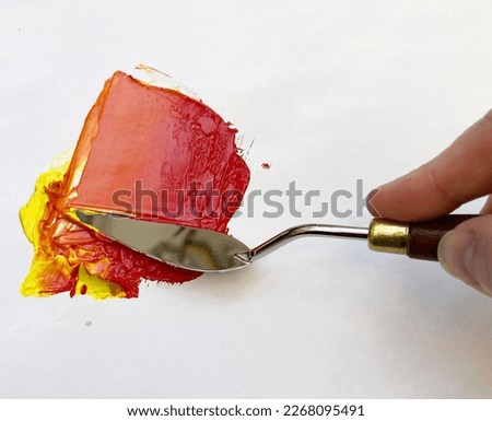 Palette knife painting with thick oil or acrylic paint to create texture Royalty-Free Stock Photo #2268095491