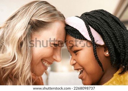 Bonding, love and girl with a foster mother for safety, care and happiness in a family home. Foster care, happy and African girl with a smile for her mom on mothers day, playful and crazy together Royalty-Free Stock Photo #2268098737