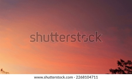 Portrait of a vast sunset sky in orange and beautiful