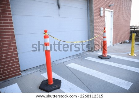 Construction cone in the street sidewalk showing caution during traffic