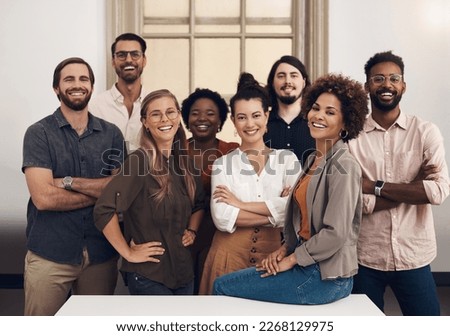 Theyre ready to push towards success with tenacity and confidence. Portrait of a group of businesspeople standing together in an office. Royalty-Free Stock Photo #2268129975