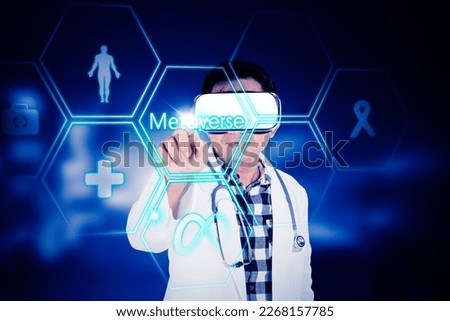 Medical metaverse: Male doctor with stethoscope wearing VR glasses touching interface screen