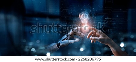 AI, Machine learning, Hands of robot and human touch on big data network, Brain data creative in light bulb, Science and artificial intelligence technology, innovation for futuristic. Royalty-Free Stock Photo #2268206795