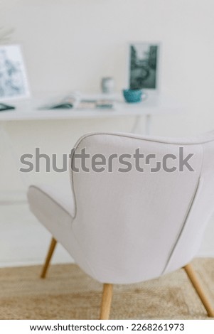 Close up pink chair in white loft