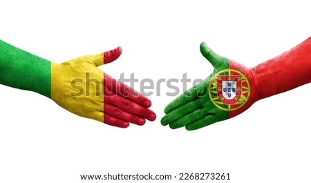 Handshake between Mali and Portugal flags painted on hands, isolated transparent image.