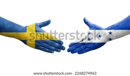 Handshake between Honduras and Sweden flags painted on hands, isolated transparent image.