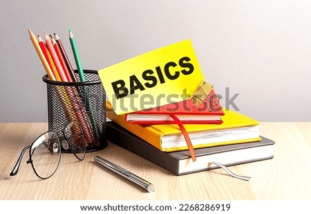 BASICS written on sticky on notebooks