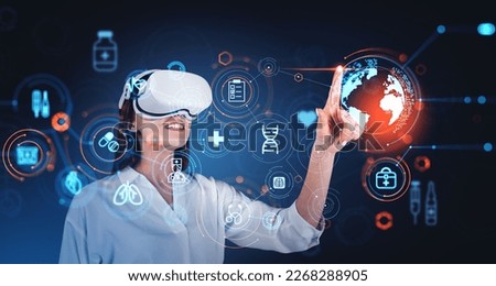 Young woman in VR glasses using immersive blurry medical interface over dark blue background. Concept of digital healthcare. Double exposure Royalty-Free Stock Photo #2268288905