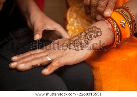 Close-up shot of mehendi being applied