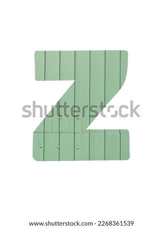 Letter Z of the alphabet made with light green wooden boards, isolated on a white background