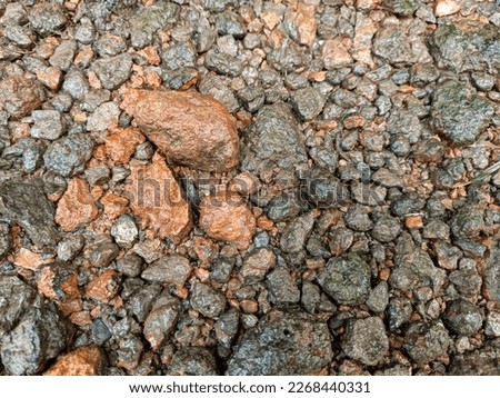beautiful stone background. object taken on a road that has been damaged 