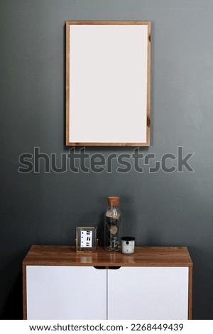 a small picture frame or poster attached to the wall