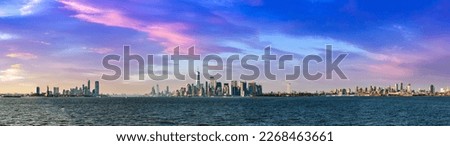 Panorama of Statue of Liberty and Manhattan and  New Jersey city  in New York City, NY, USA