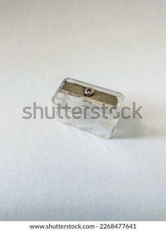 Close up office tool a pencil sharpener on white paper background