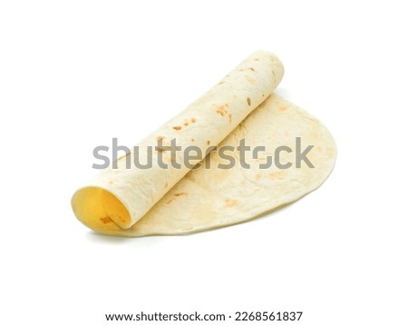 Half rolled up tortilla lavash bread isolated on white background