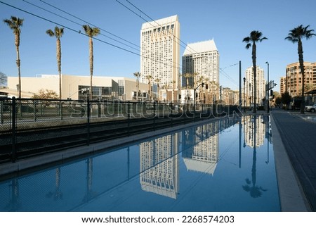San Diego, California, USA downtown cityscape and skyline with water reflections.