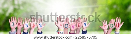 Children Hands Building Word Jesus Loves You, Grass Meadow