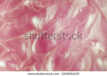 Glowing pink mermaid shimmering cosmetic miracle texture gel body spray Royalty-Free Stock Photo #2268586229