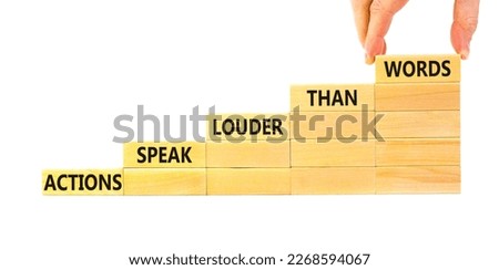 Actions speak louder words symbol. Concept words Actions speak louder than words on wooden blocks. Beautiful white table white background. Business new mindset for results concept. Copy space.