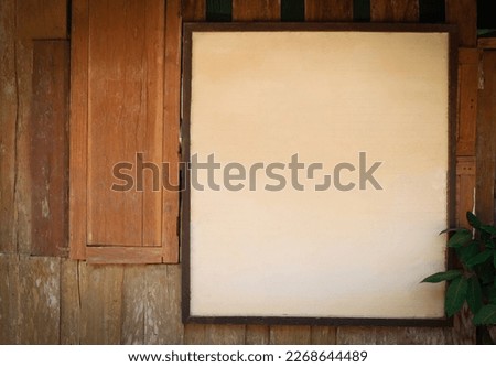 Blank space, old white board. Board on old wooden background. In the community, billboards