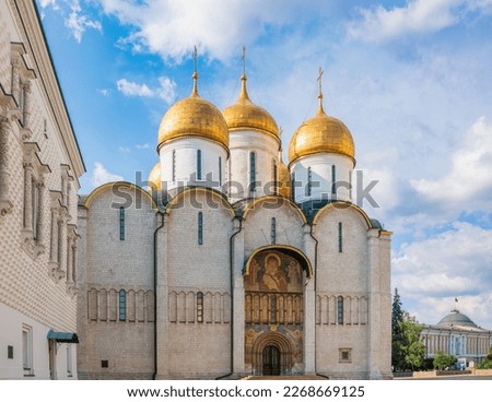 The Dormition Cathedral in Moscow Kremlin, also known as the Assumption Cathedral or Cathedral of the Assumption. Cathedral of Dormition is Russian Orthodox church dedicated to Dormition of Theotokos Royalty-Free Stock Photo #2268669125