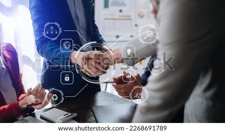 Working team meeting concept, business using laptop and smart phone and digital tablet computer with digital marketing media  in virtual icon network diagram office
