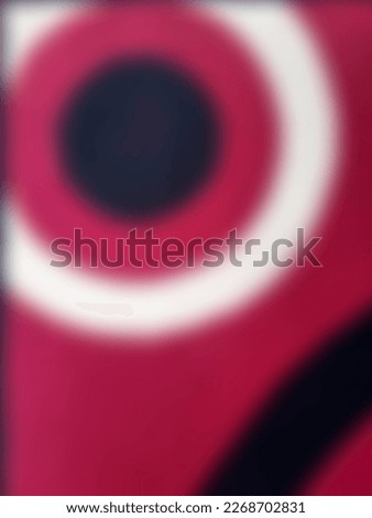 Blur photo of the red carpet with abstract circle patterns that I took in the living room
