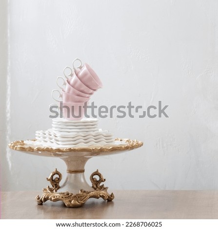 dishes for serving tea on wooden table on white background