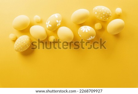 Happy easter! Colourful Easter eggs on yellow background. Decoration concept for greetings and presents on Easter Day celebrate time.