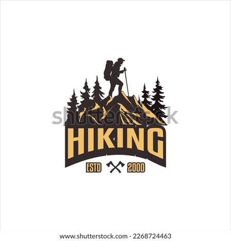 mountain adventure logo mountain climbing man on top of mountain standing, vintage logo mountain silhouette, carrying backpack. for camping equipment rental logo, camping equipment store Royalty-Free Stock Photo #2268724463