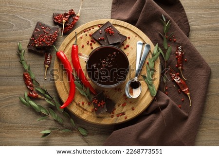 Concept of delicious food - chocolate with pepper and hot chocolate with pepper