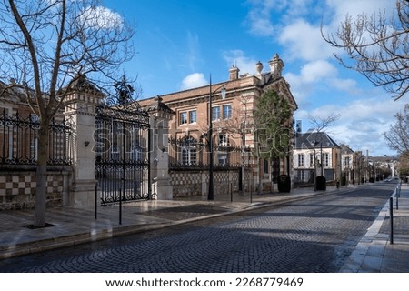 Beautiful French architecture elements and houses in Champagne sparkling wine making town Epernay, Avenue of Champagne tourists street, France at winter Royalty-Free Stock Photo #2268779469