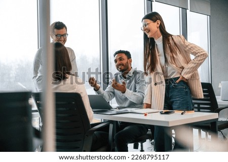 Conception of brainstorming. Four people are working in the office together. Royalty-Free Stock Photo #2268795117