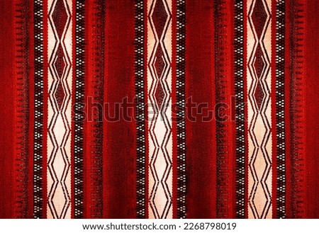 A Vintage Style Traditional Motifs Arabian Retro Sadu Red Rug Royalty-Free Stock Photo #2268798019