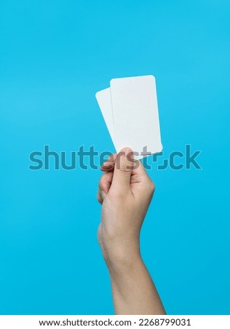 People hand holding a business cards
