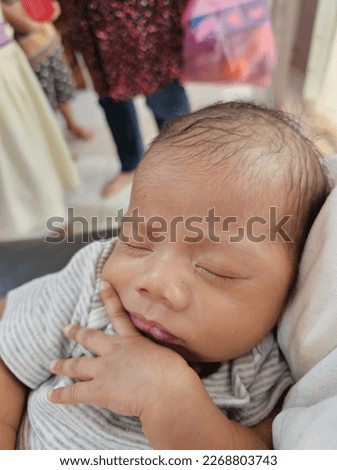 KUALA LUMPUR, MALAYSIA - 1st March 2023: Pictures of a sleeping baby boy.