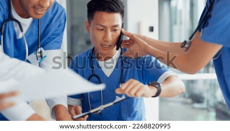 Busy, phone call and doctor with medical paperwork, hospital chaos and anxiety from healthcare work. Clinic schedule, communication and Asian nurse with help from employees during overwhelming agenda