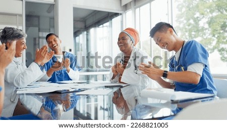 Doctors, nurses and meeting with documents in hospital discussing medical records. Teamwork, planning and group of healthcare professionals, men and women with paperwork talking in training workshop. Royalty-Free Stock Photo #2268821005