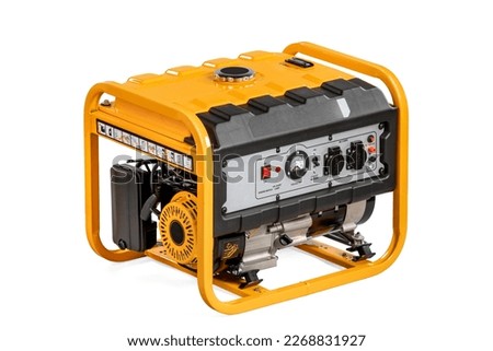 Portable electric AC generator, isolated on white. Diesel or petrol generator for home and industrial use. Gasoline powered engine. Backup energy. Royalty-Free Stock Photo #2268831927