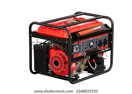 Portable electric AC generator, isolated on white. Diesel or petrol generator for home and industrial use. Gasoline powered engine. Backup energy. Royalty-Free Stock Photo #2268831931