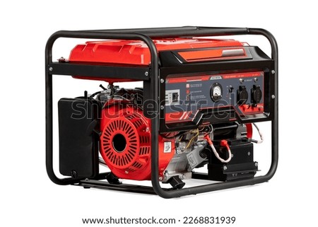 Portable electric AC generator, isolated on white. Diesel or petrol generator for home and industrial use. Gasoline powered engine. Backup energy. Royalty-Free Stock Photo #2268831939