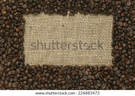 Caffe edition, coffee beans on Jute background