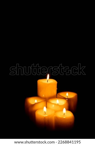 Set of candles on a black background with copy space. Holy Week, Good Friday, Pentecost, Religiosity and spirituality Royalty-Free Stock Photo #2268841195